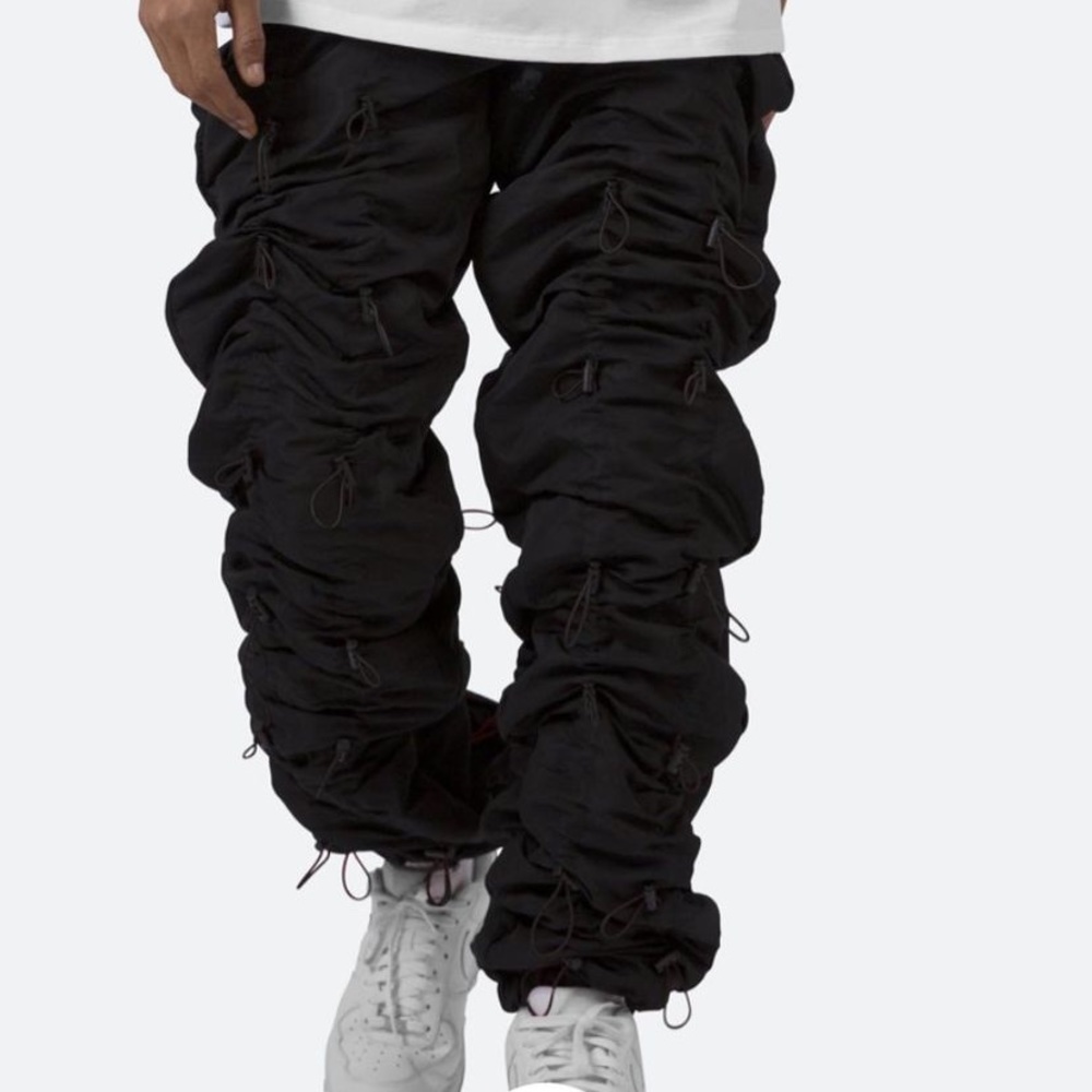 black stacked pants